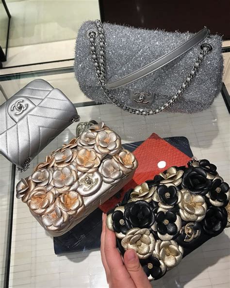 chanel hard case flower clutch|Chanel handbags for men.